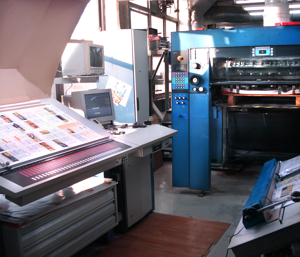sheet-fed 4 color press and light box in New York's printing district